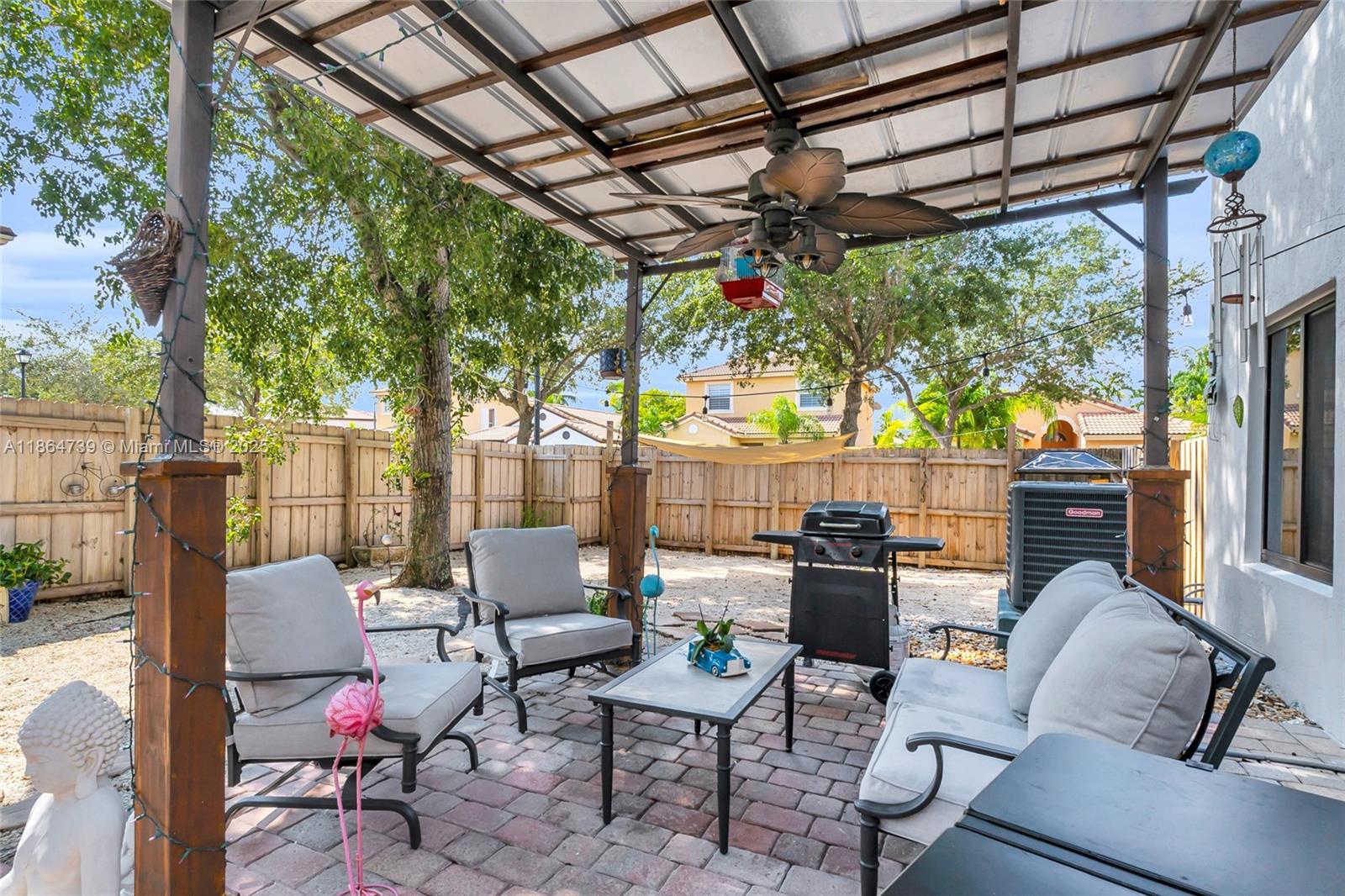 1635 Southeast 20th Terrace Homestead, FL 33035 - Photo 50 of 52 a building outdoor space with patio furniture