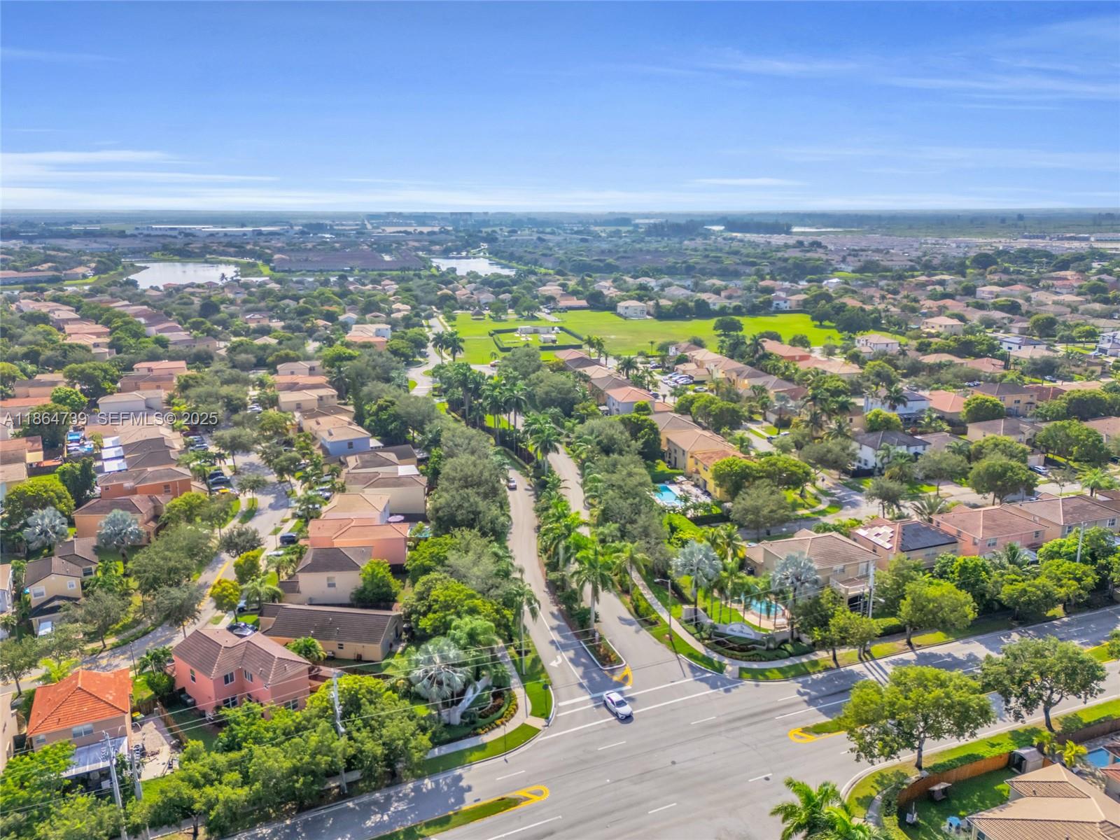 1635 Southeast 20th Terrace Homestead, FL 33035 - Photo 6 of 52 an aerial view of residential building and lake