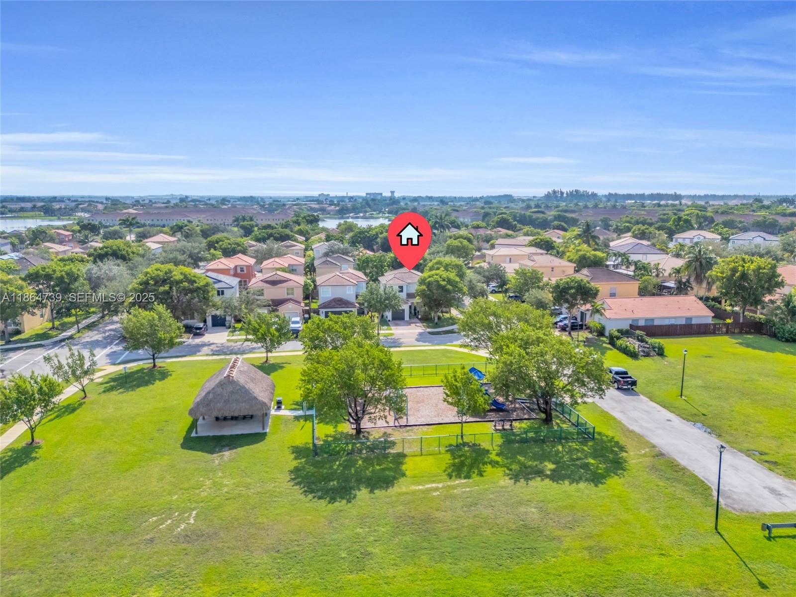 1635 Southeast 20th Terrace Homestead, FL 33035 - Photo 8 of 52 an aerial view of residential houses with outdoor space