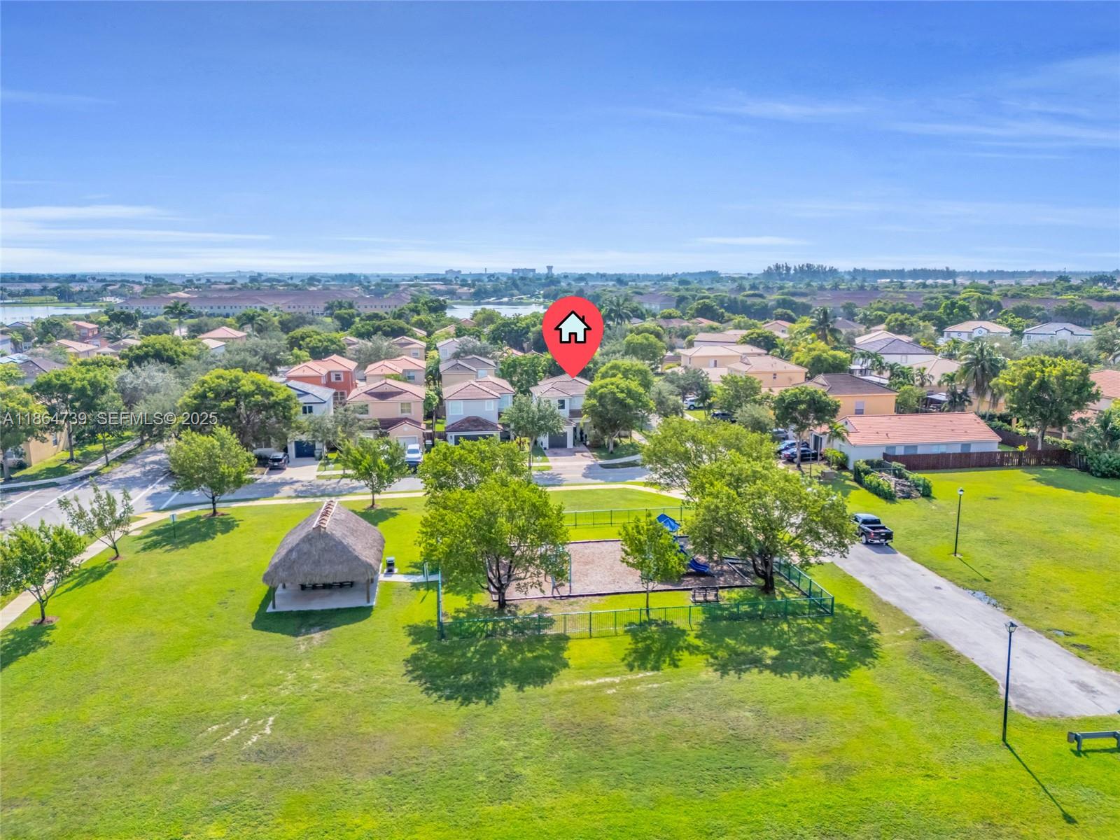 1635 Southeast 20th Terrace Homestead, FL 33035 - Photo 9 of 52 an aerial view of residential houses with outdoor space