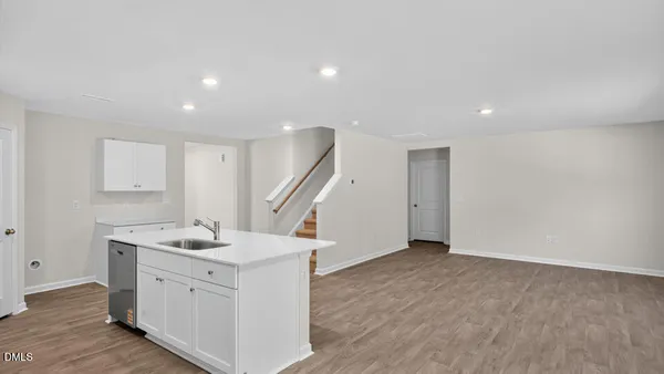 a view of utility room with wooden floor