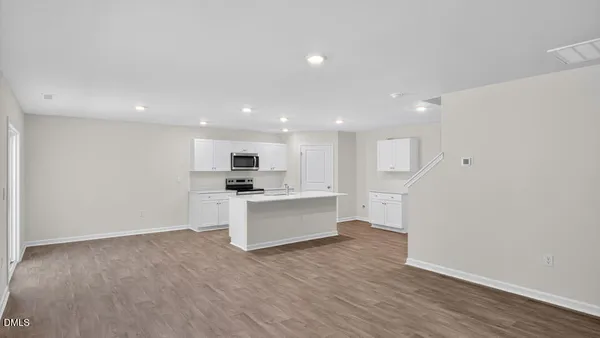 a view of kitchen with wooden floor
