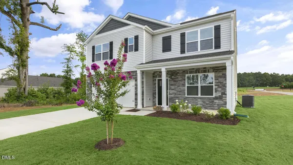 a house view with a garden space