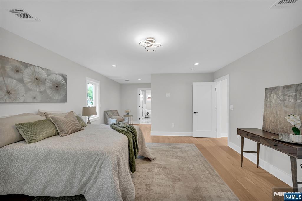 46 Snyder Avenue Berkeley Heights, NJ 07922 - Photo 16 of 38 a bedroom with a bed and a dresser in it