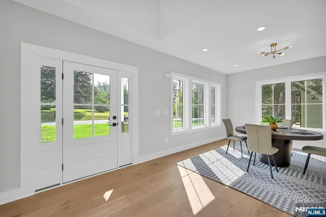 a view of a dining room with furniture window and outside view