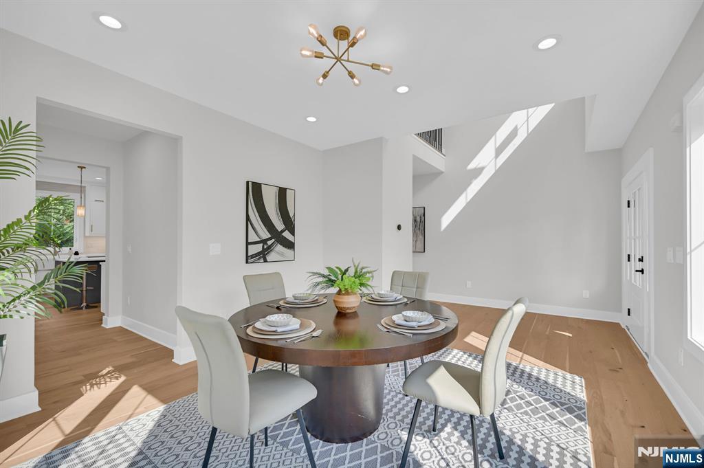 46 Snyder Avenue Berkeley Heights, NJ 07922 - Photo 3 of 38 a view of a dining room with furniture and wooden floor