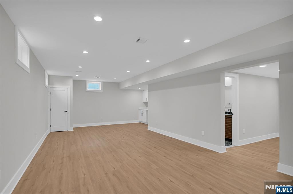 46 Snyder Avenue Berkeley Heights, NJ 07922 - Photo 31 of 38 a view of an empty room with wooden floor