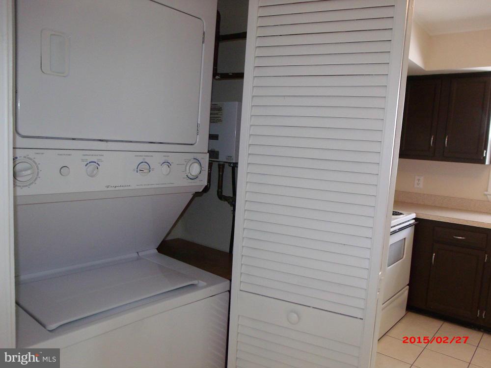8159 Telegraph Road Severn, MD 21144 - Photo 8 of 18 Stackable washer and dryer in a closet