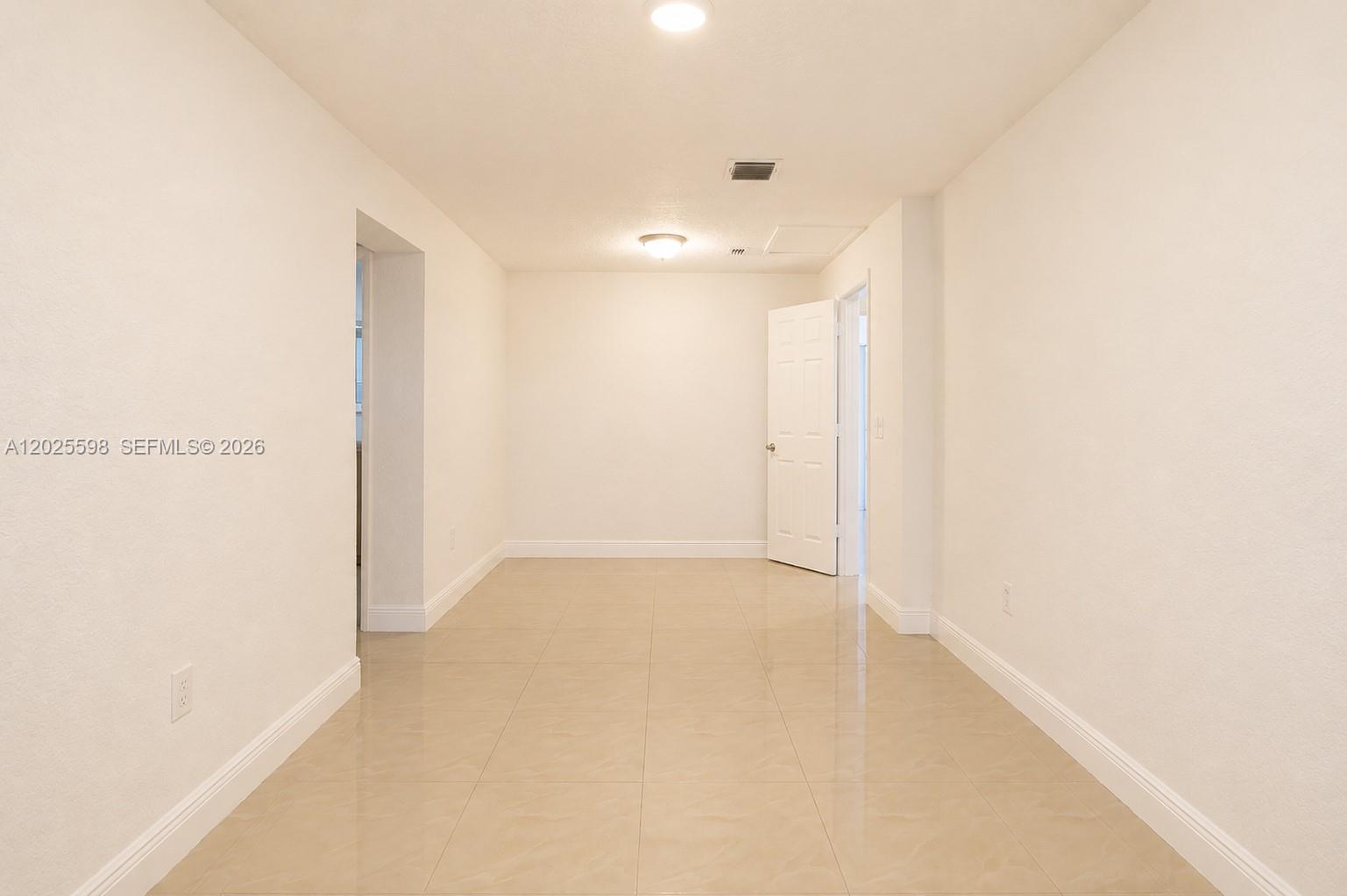 9421 Southwest 150th Street Miami, FL 33176 - Photo 20 of 31 a view of an empty room