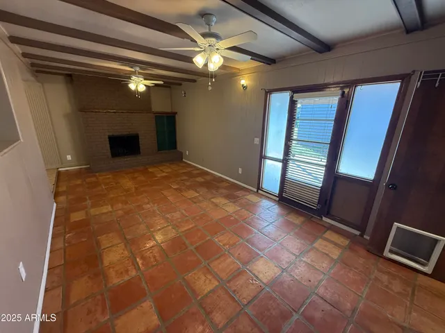 a view of a livingroom with a fireplace