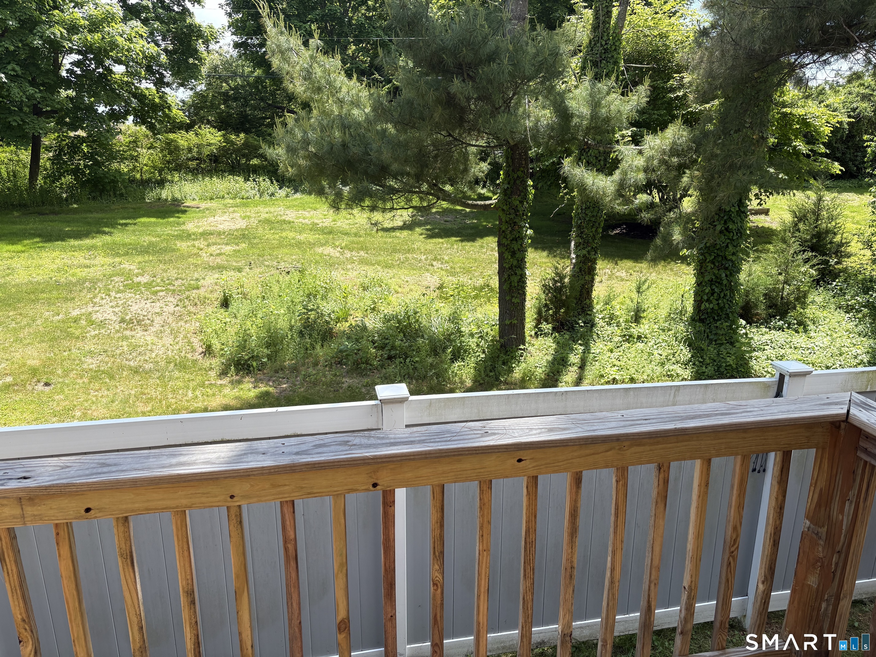 116 Commerce Street, Unit 5 Clinton, CT 06413 - Photo 17 of 18 a view of swimming pool from a balcony
