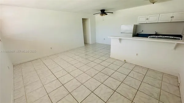 a view of a storage & utility room with a sink