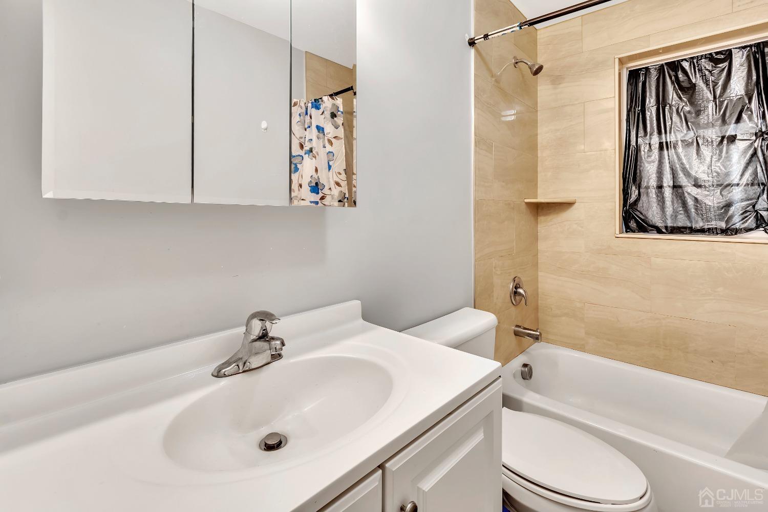 B Wright Place New Brunswick, NJ 08901 - Photo 14 of 34 a bathroom with a sink toilet and shower