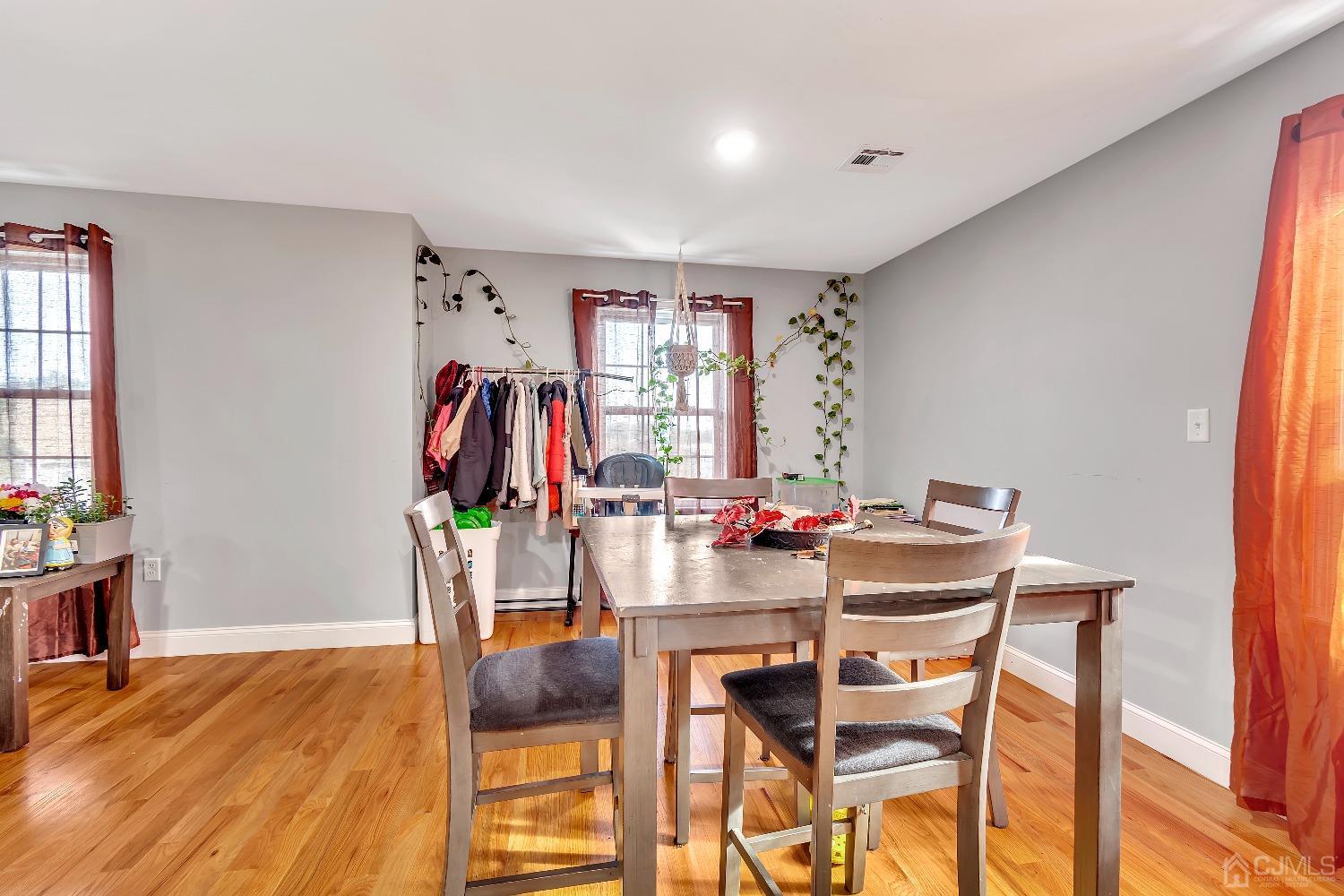 B Wright Place New Brunswick, NJ 08901 - Photo 24 of 34 a view of a dining room with furniture and wooden floor