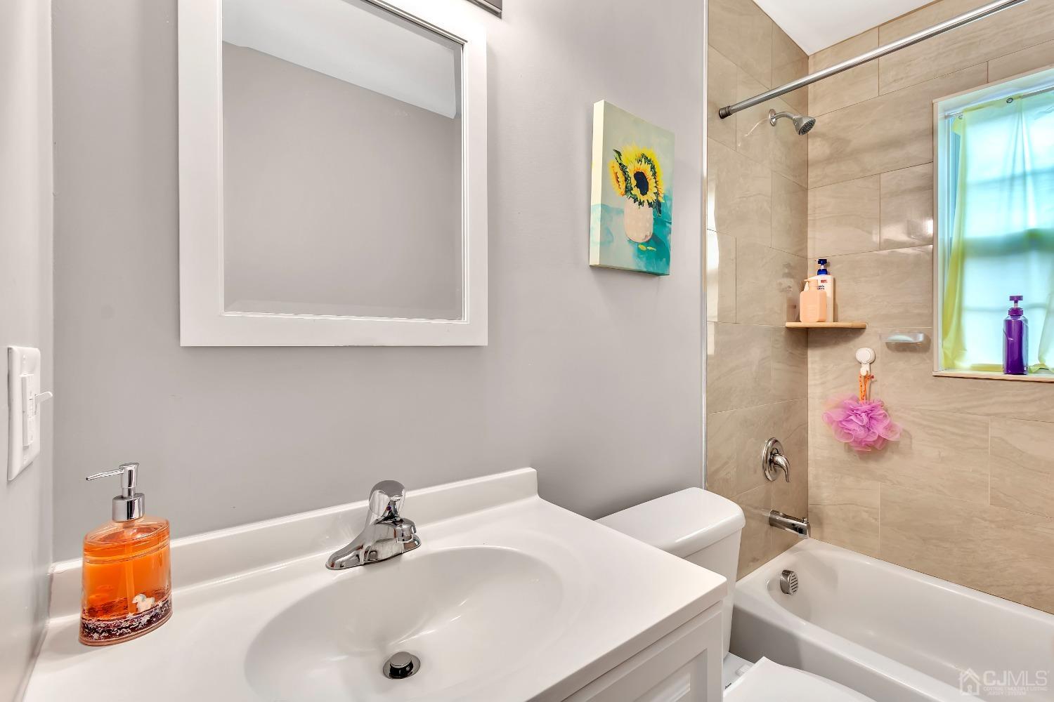 B Wright Place New Brunswick, NJ 08901 - Photo 29 of 34 a bathroom with a sink and a shower