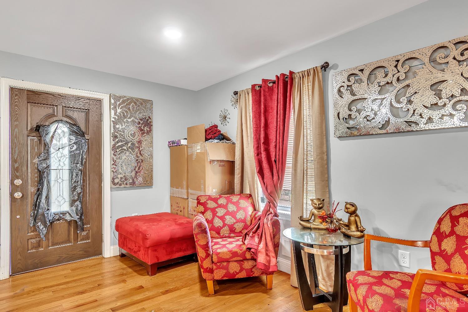 B Wright Place New Brunswick, NJ 08901 - Photo 7 of 34 a bedroom with furniture and a large window