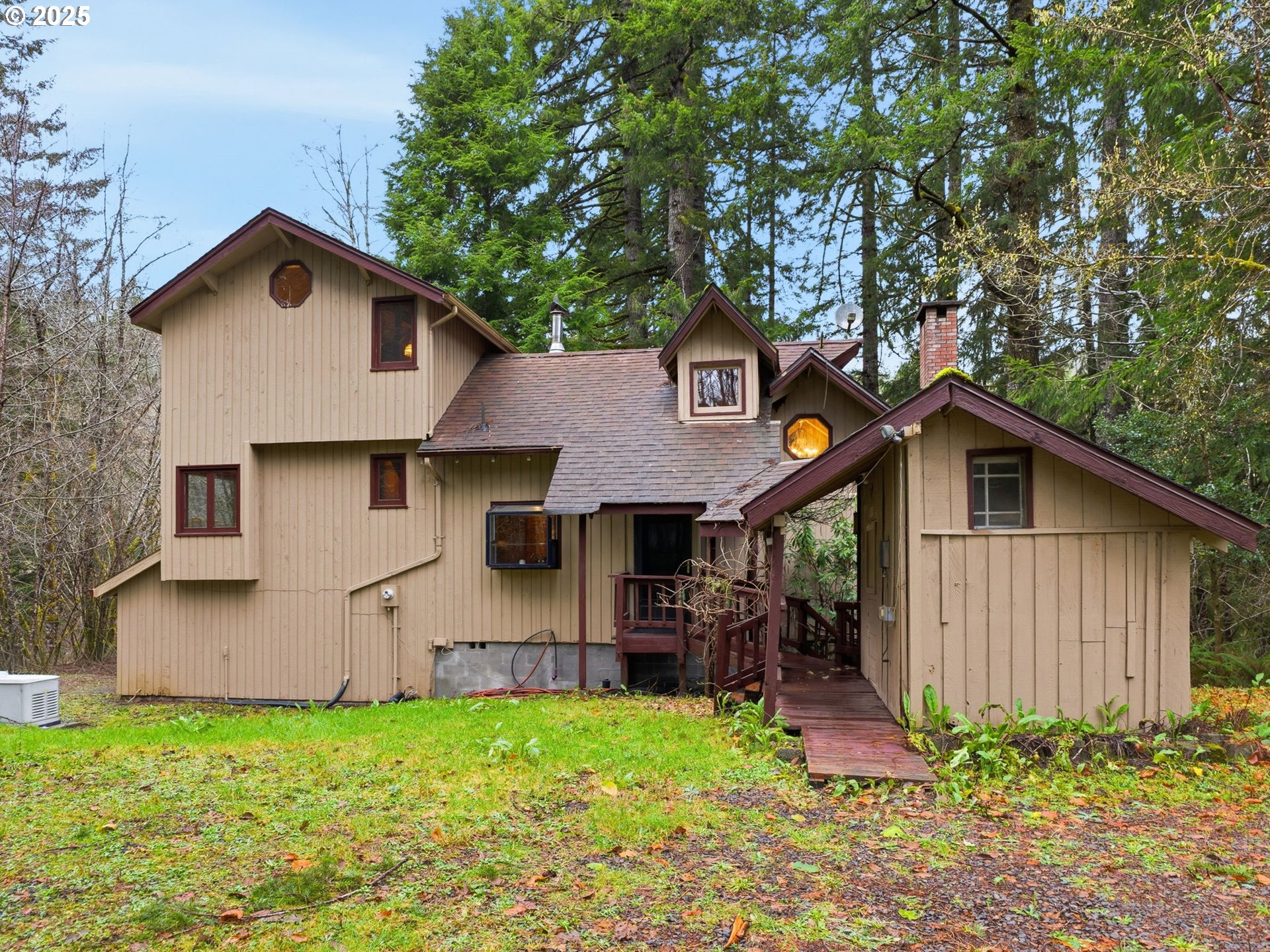 78506 Highway 53 Nehalem, OR 97131 - Photo 1 of 48 a front view of house with yard and seating area