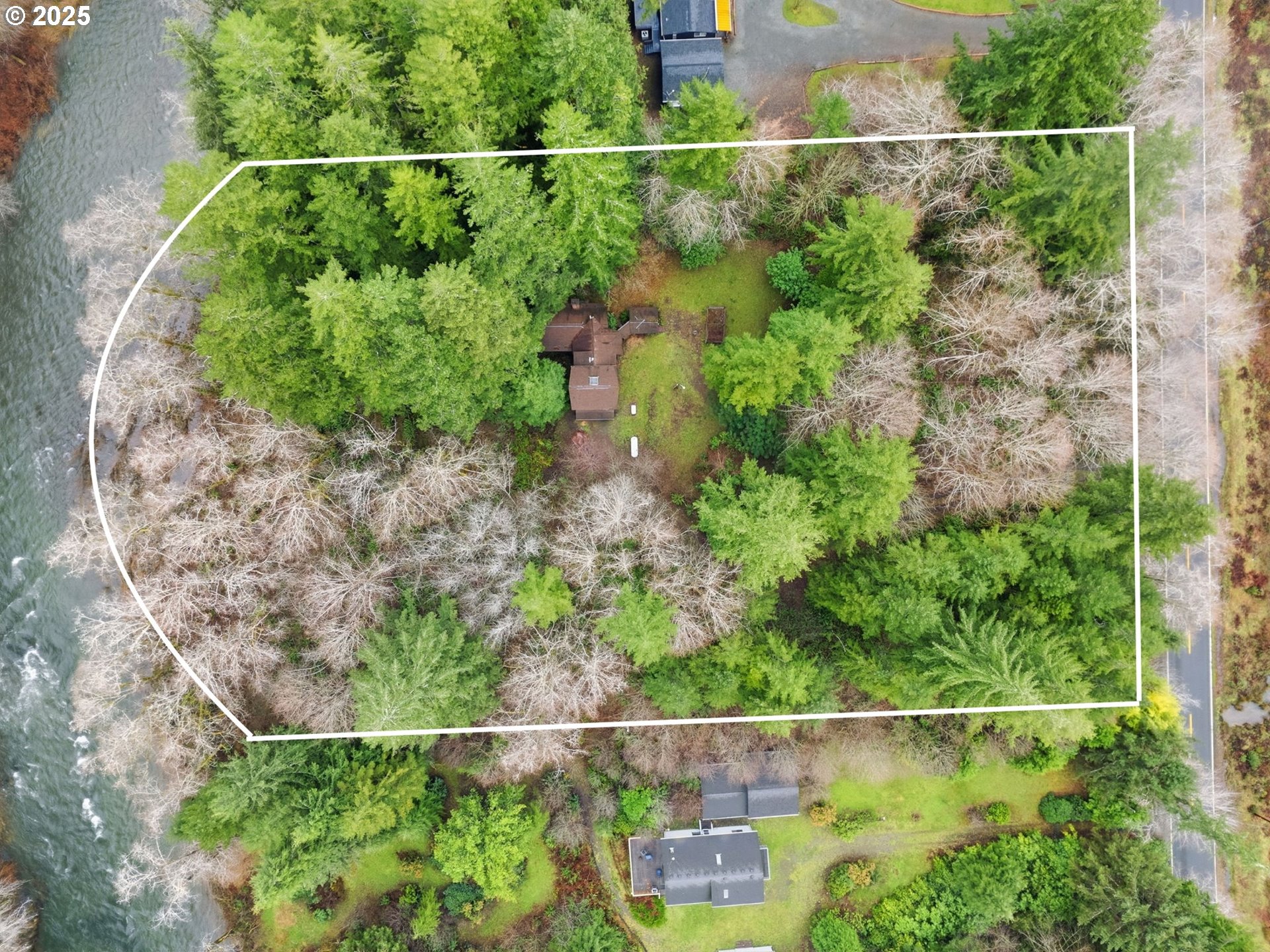 78506 Highway 53 Nehalem, OR 97131 - Photo 16 of 48 a view of a yard and mountain view