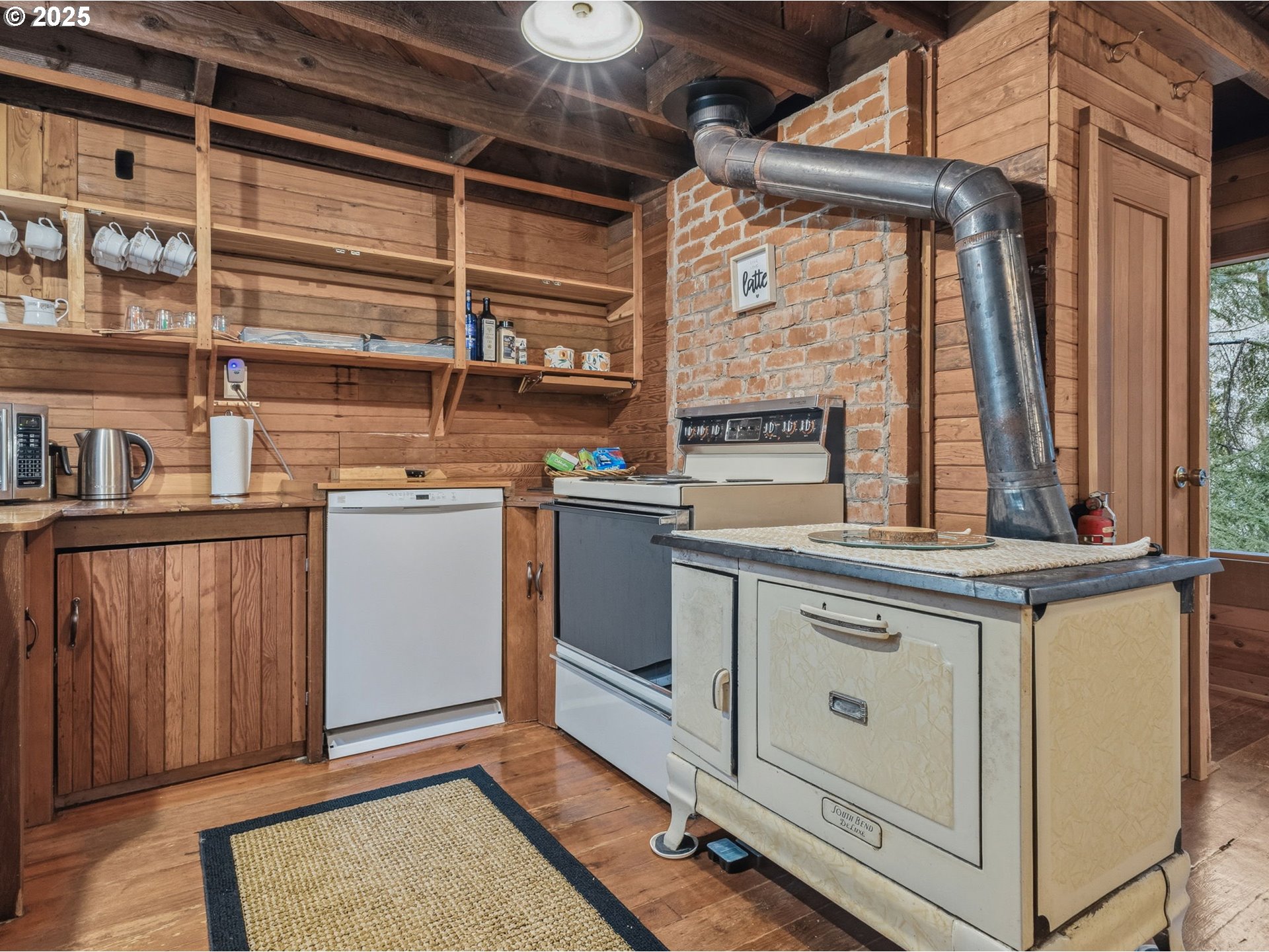 78506 Highway 53 Nehalem, OR 97131 - Photo 19 of 48 a view of a kitchen with washer and dryer
