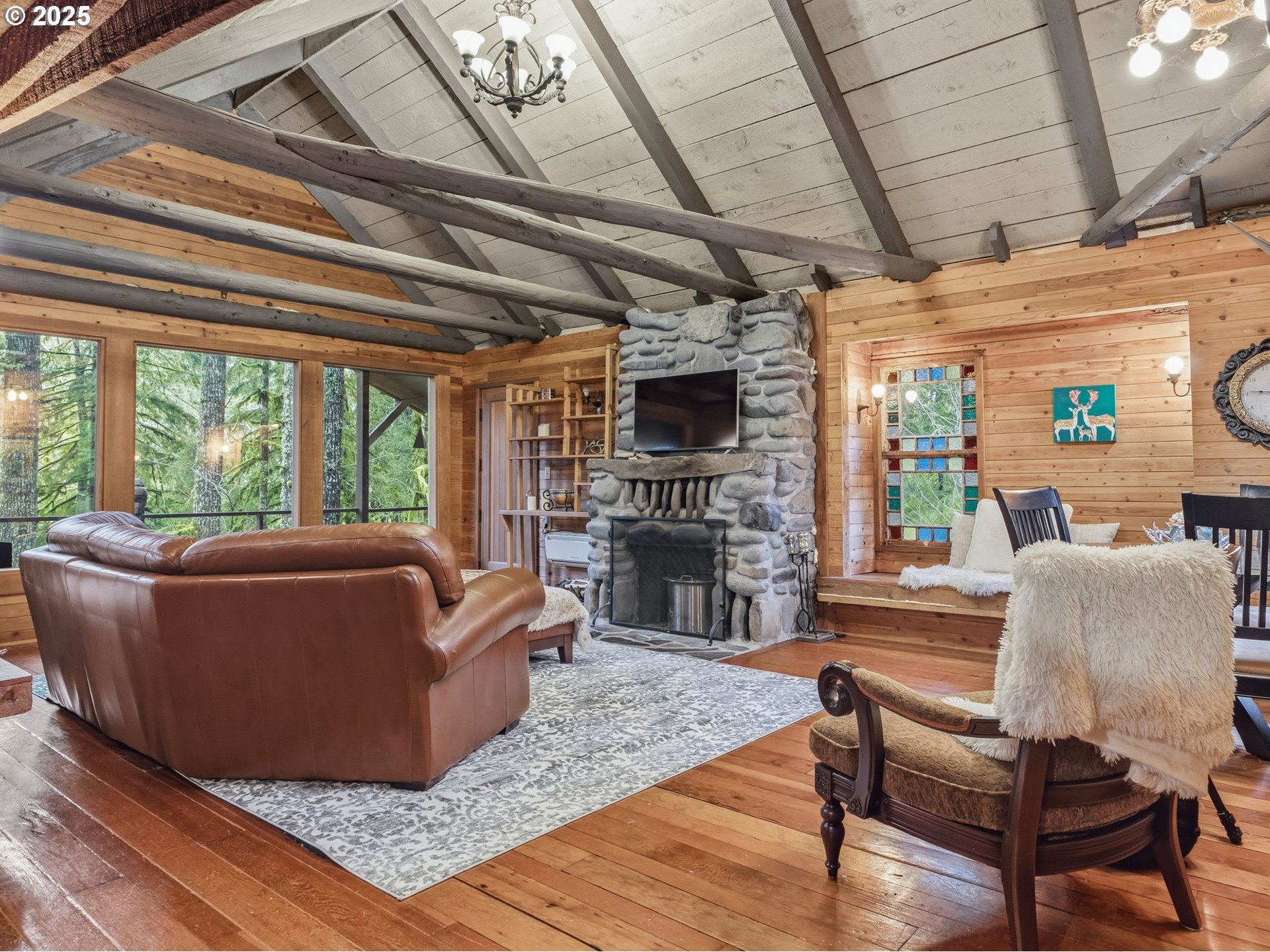 78506 Highway 53 Nehalem, OR 97131 - Photo 23 of 48 a living room with furniture and a fireplace