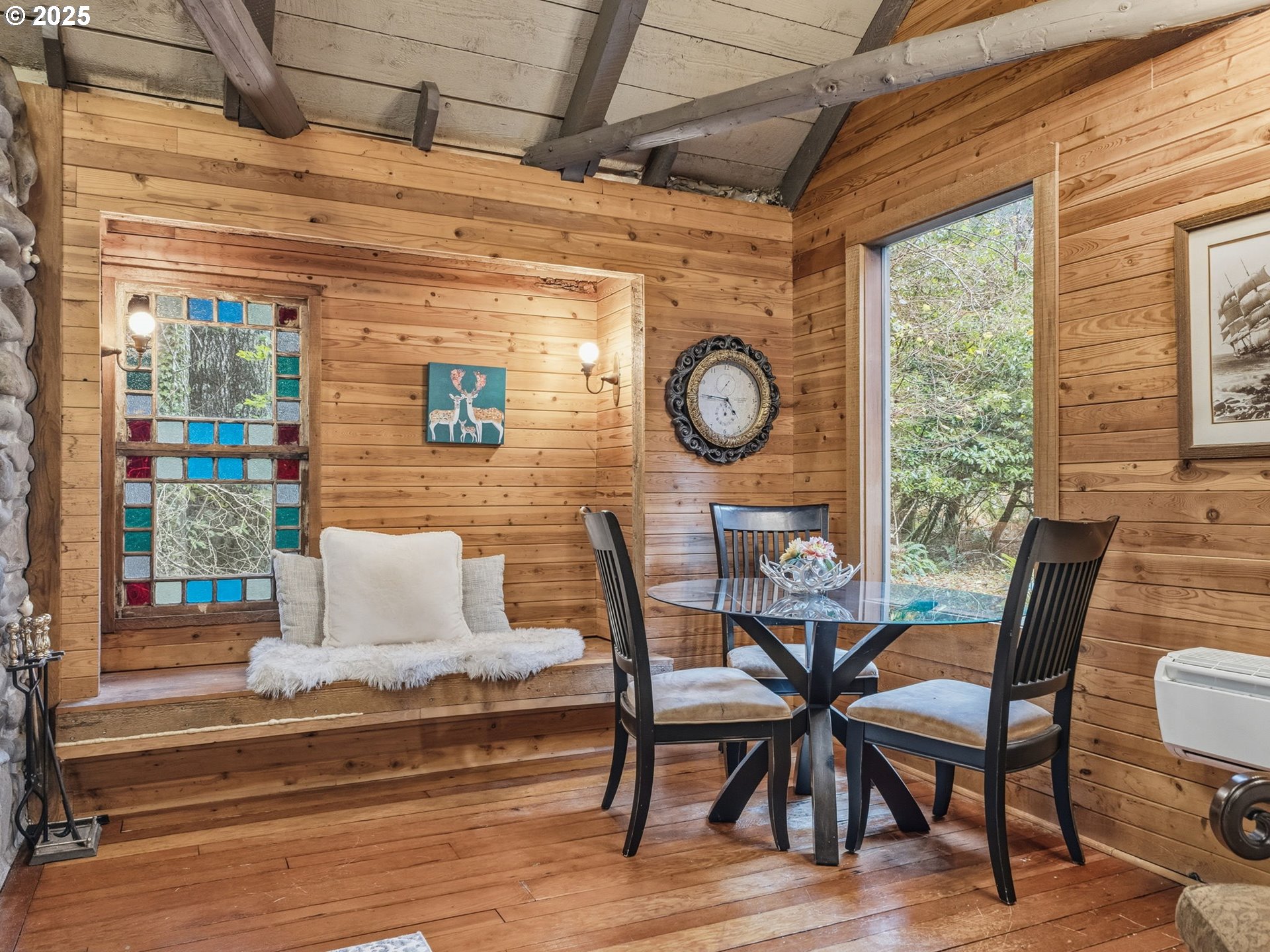 78506 Highway 53 Nehalem, OR 97131 - Photo 29 of 48 a view of a dining room with a table and chairs