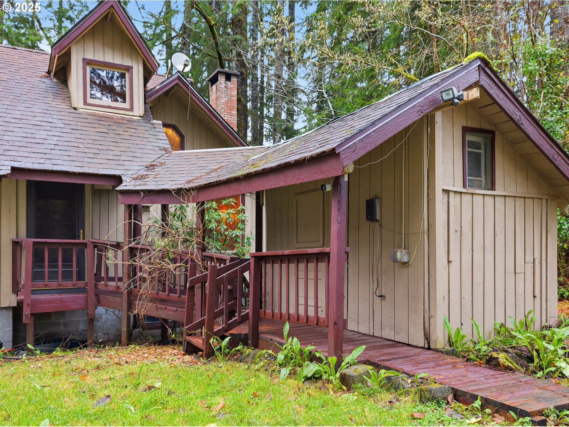 78506 Highway 53 Nehalem, OR 97131 - Photo 3 of 48 a front view of a house with garden