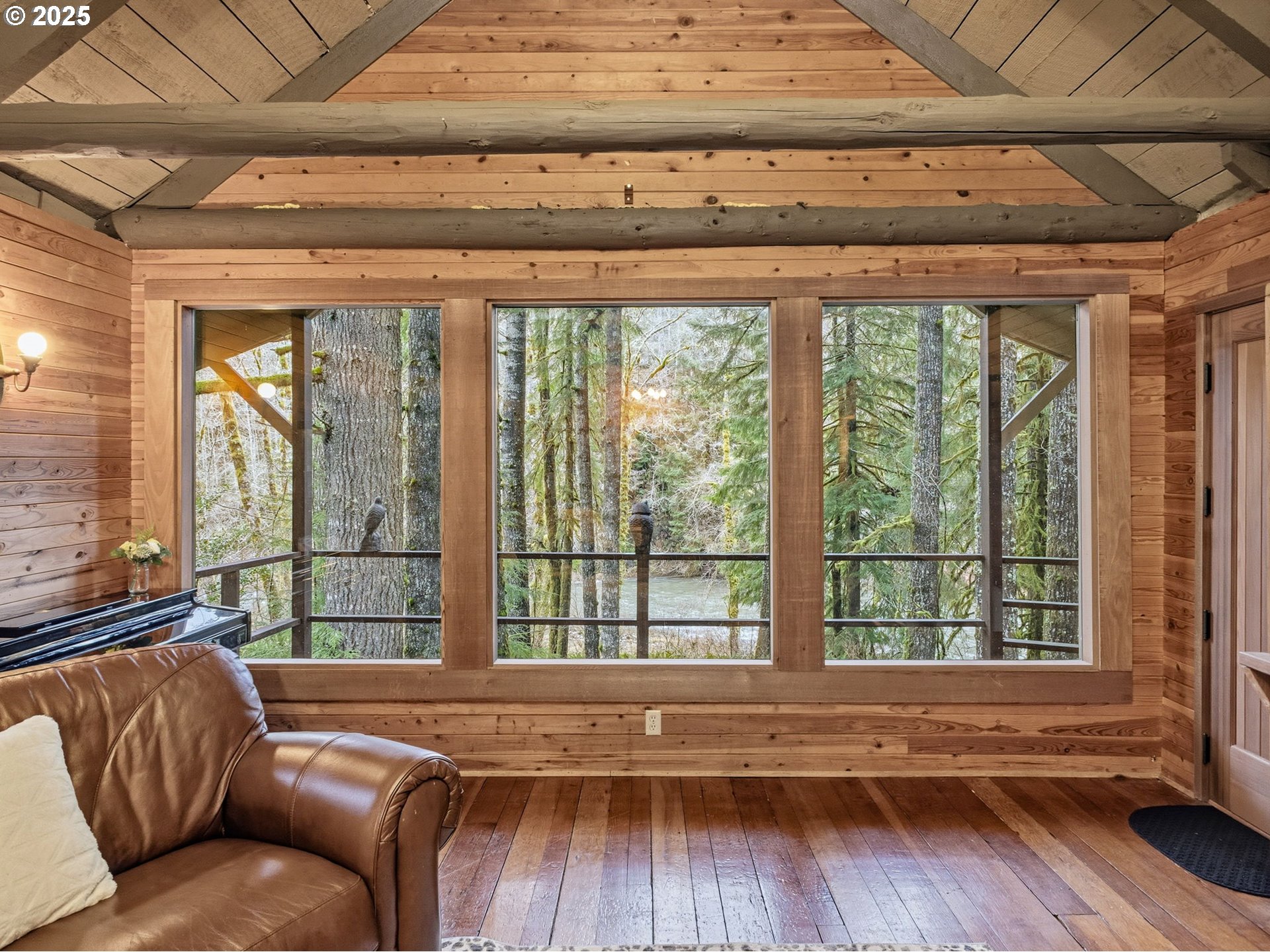 78506 Highway 53 Nehalem, OR 97131 - Photo 31 of 48 a living room with furniture and wooden floors