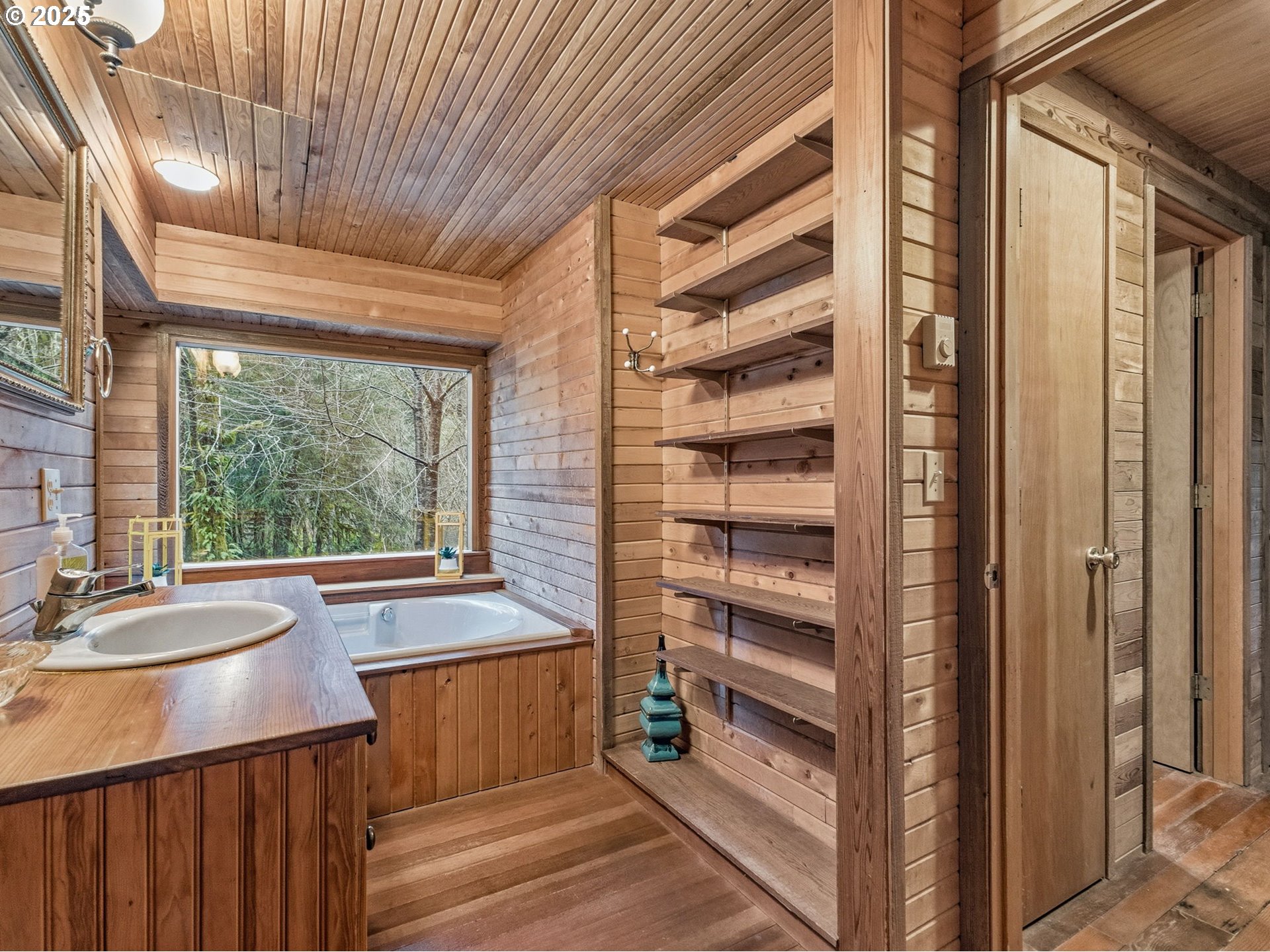 78506 Highway 53 Nehalem, OR 97131 - Photo 36 of 48 a kitchen with a sink and large window