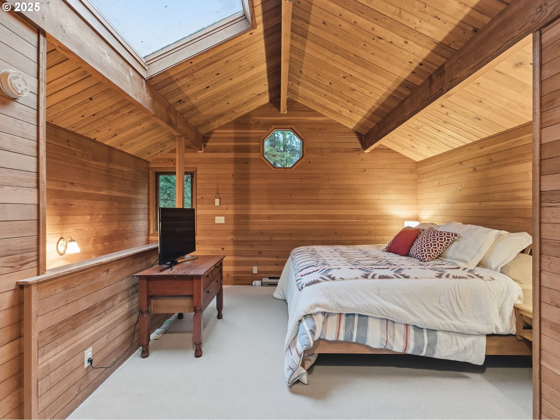 78506 Highway 53 Nehalem, OR 97131 - Photo 39 of 48 a bedroom with a bed and a window