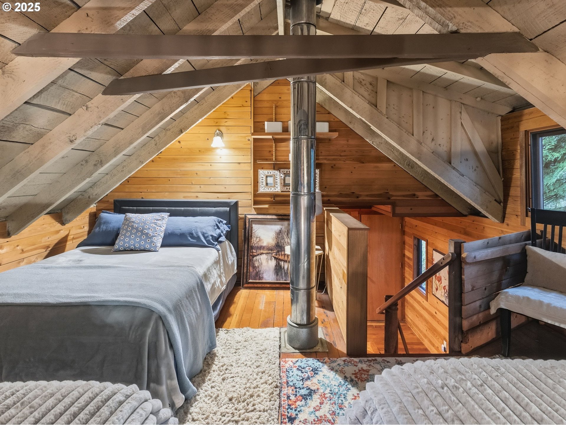 78506 Highway 53 Nehalem, OR 97131 - Photo 41 of 48 a bed sitting in a bedroom next to a window