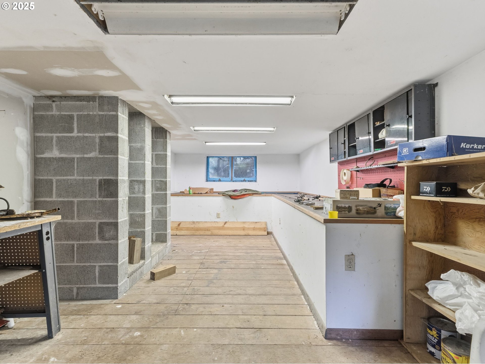 78506 Highway 53 Nehalem, OR 97131 - Photo 45 of 48 a kitchen with stainless steel appliances kitchen island granite countertop a refrigerator and a stove