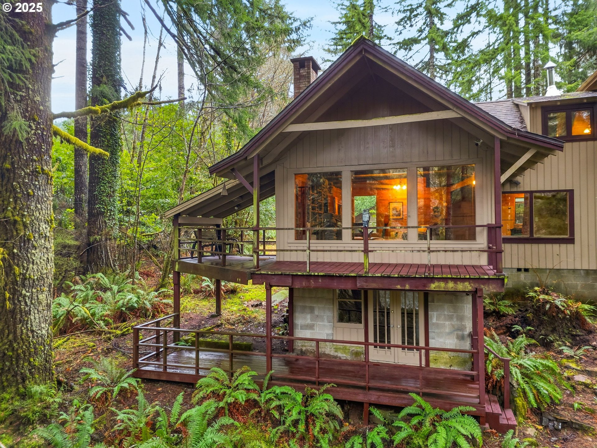 78506 Highway 53 Nehalem, OR 97131 - Photo 5 of 48 a front view of a house with garden