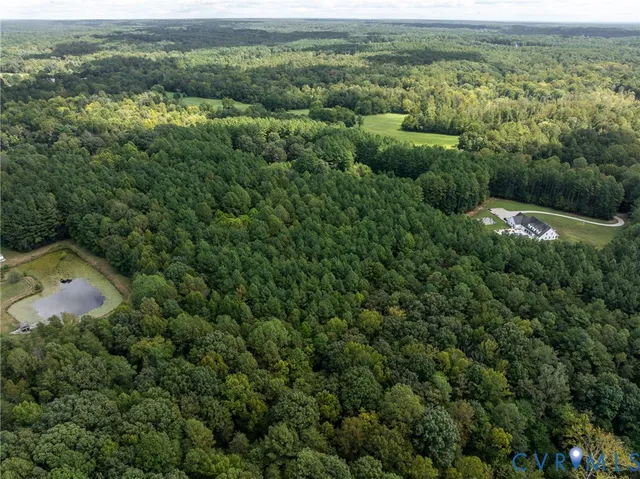a view of a river and mountains in the background