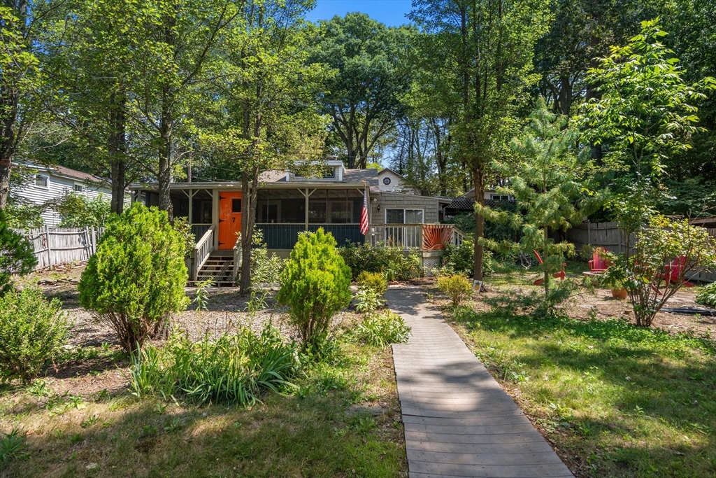 7 Victoria Avenue Rutland, MA 01543 - Photo 1 of 21 a view of backyard with potted plants and large tree