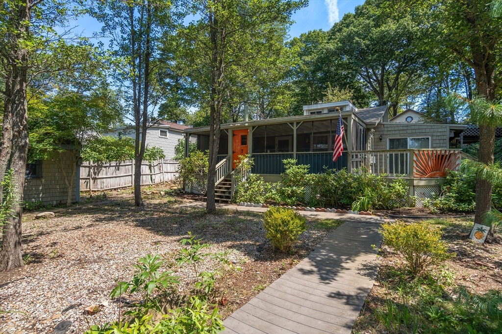 7 Victoria Avenue Rutland, MA 01543 - Photo 14 of 21 a view of a yard with plants and large trees