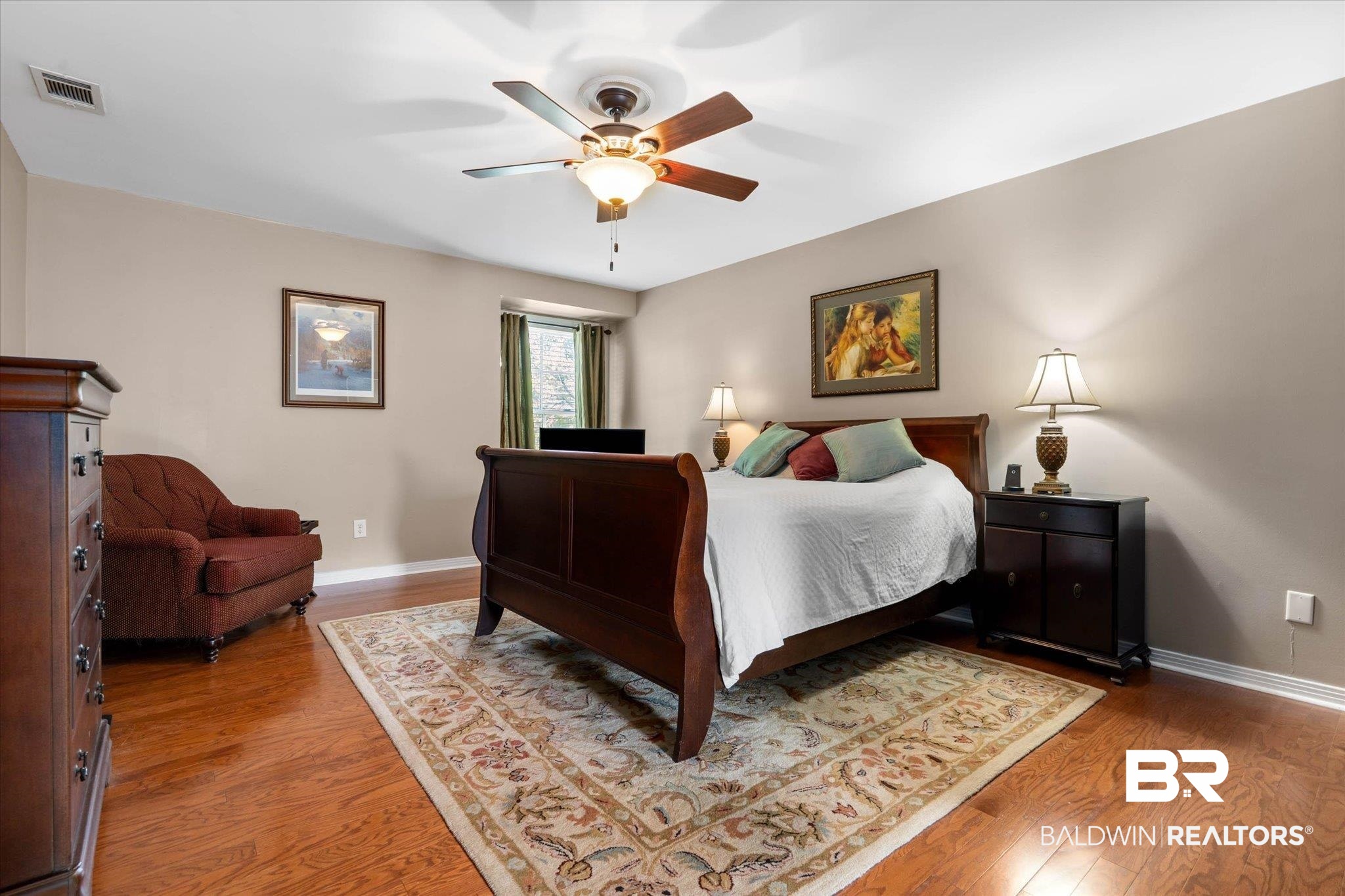 559 East Cumberland Road Mobile, AL 36608 - Photo 23 of 48 Bedroom featuring a ceiling fan and wood finished floors