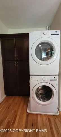 a view of wooden floor with a fireplace