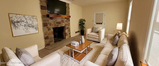 a view of empty room with windows