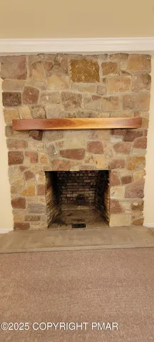 a bed room with furniture and a flat screen tv