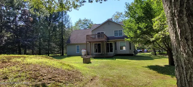 a kitchen with a sink appliances and cabinets