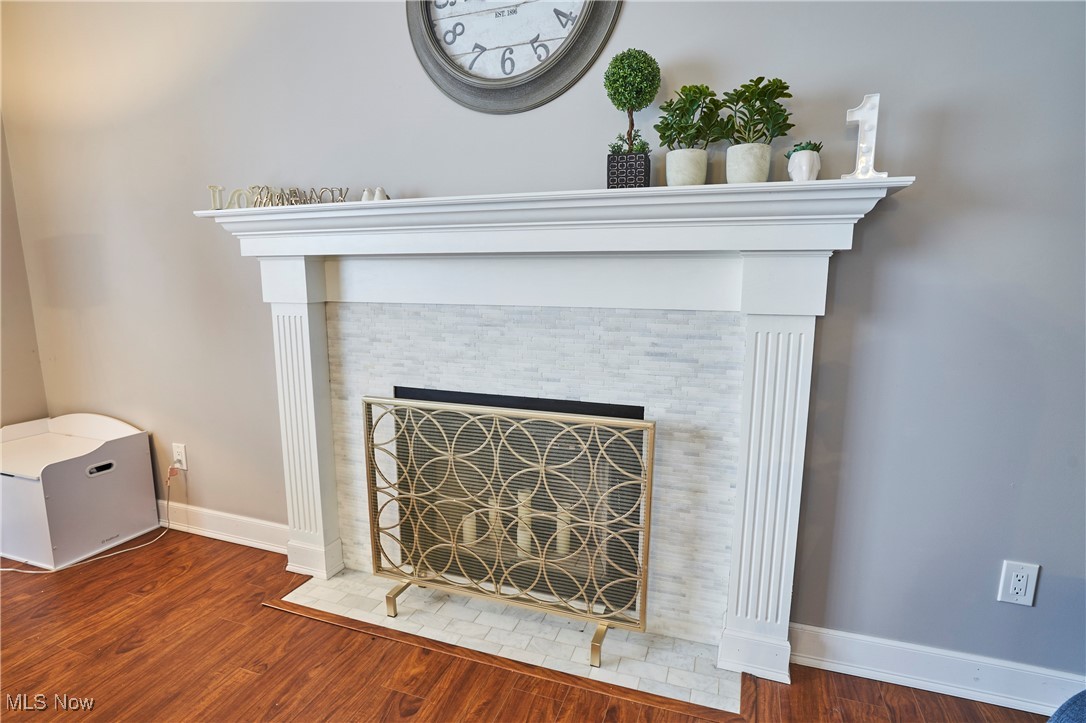 637 Redfield Lane Akron, OH 44321 - Photo 13 of 31 Beautiful woodburning fireplace with a natural marble facing