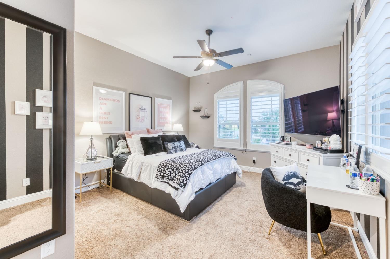 1967 Powers Avenue Clovis, CA 93619 - Photo 34 of 71 a living room with furniture and a flat screen tv