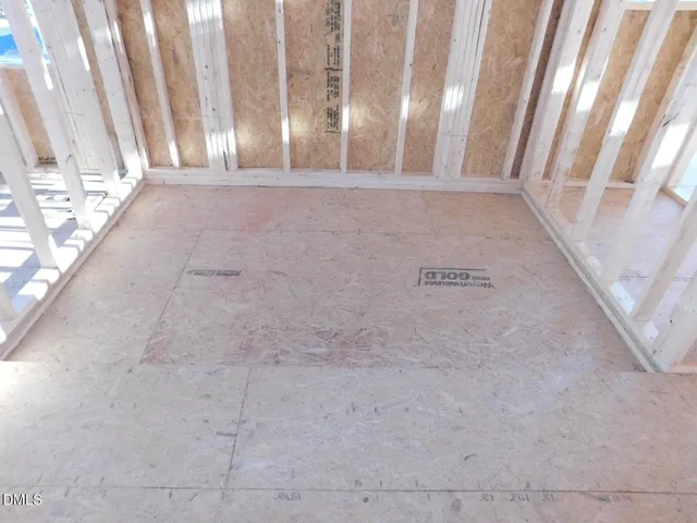 a view of a bathroom with white door