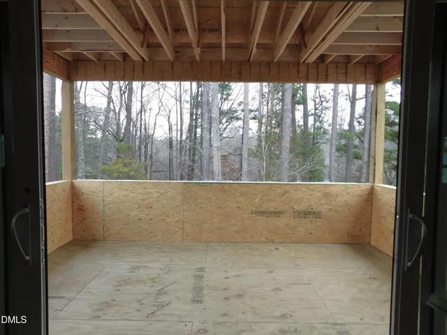 a view of a living room and dining room
