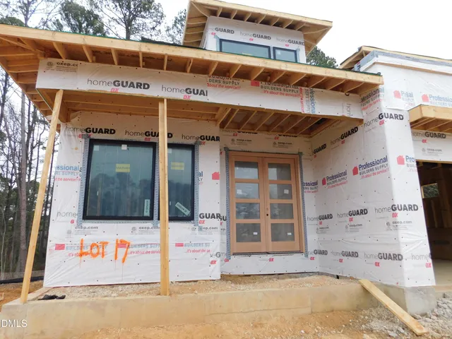a room with a large window and a couch