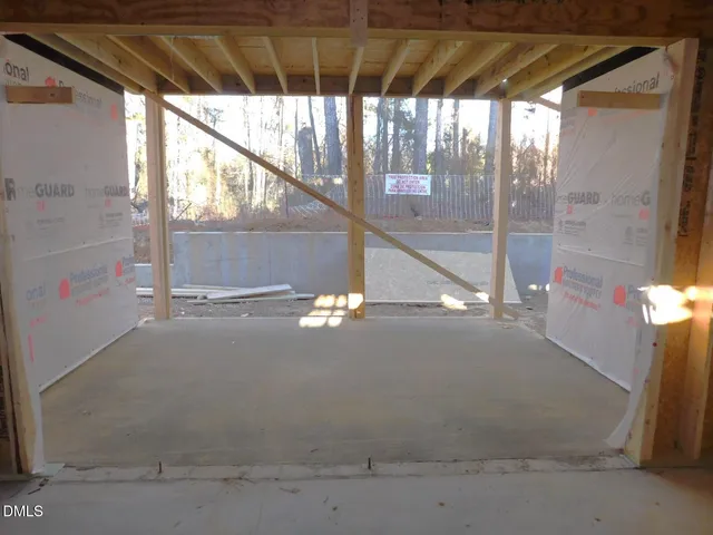 a living room with a couch and a flat screen tv
