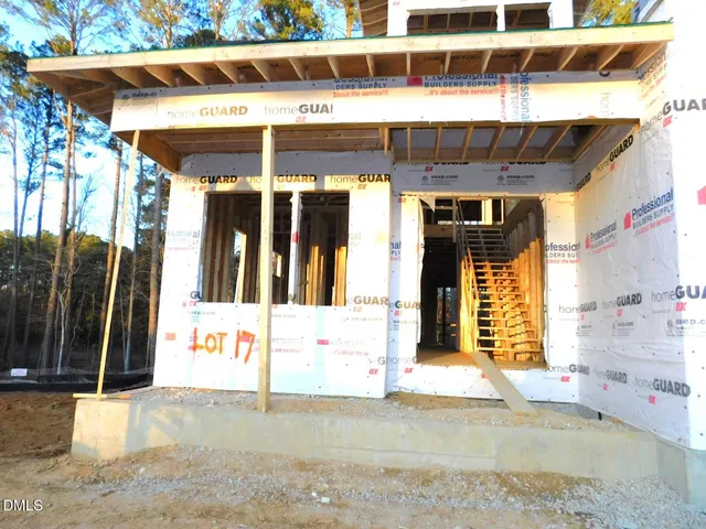 a front view of a building with glass windows