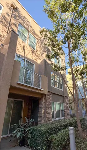 a bathroom with a double vanity sink mirror and toilet