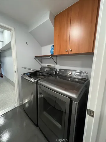 a view of an empty room with windows