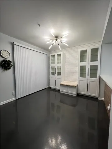 a large bathroom with a double vanity sink and a mirror